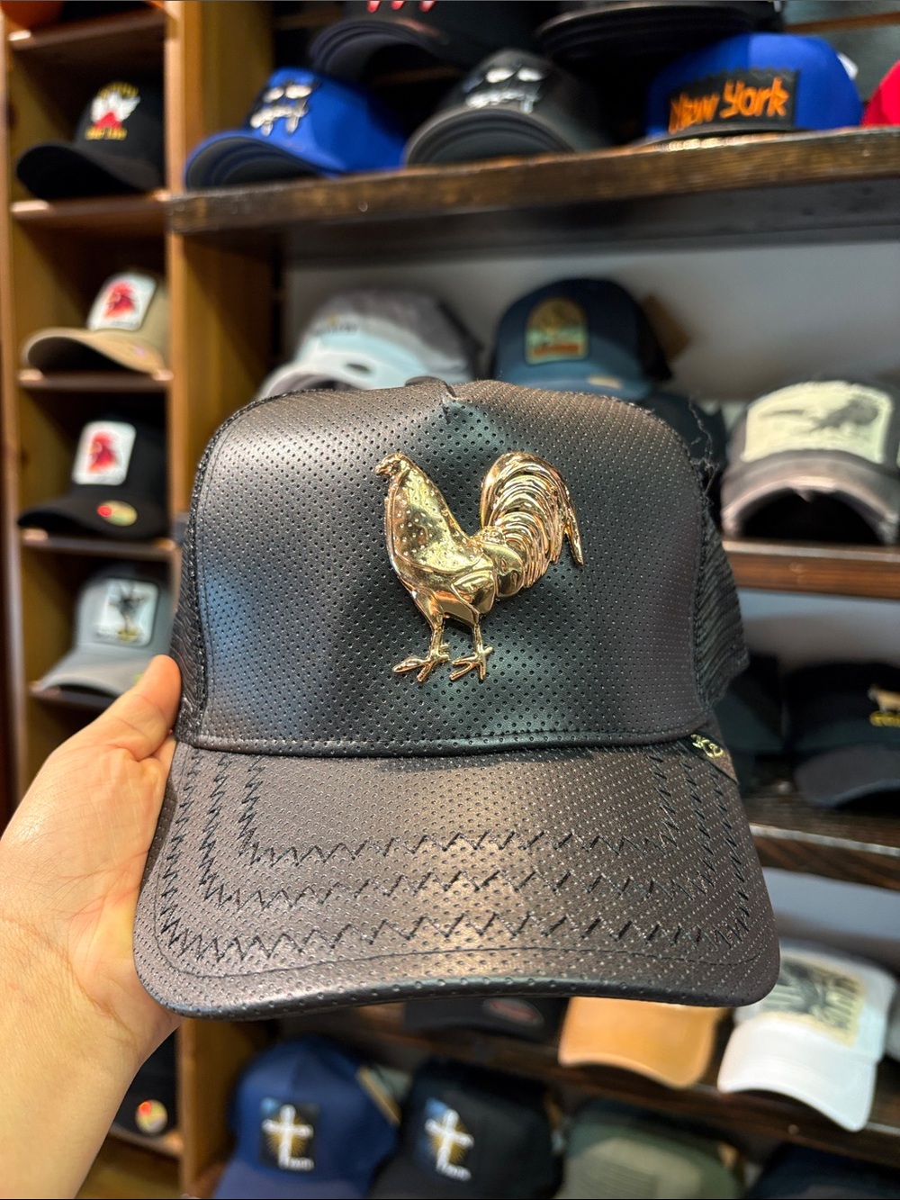 Black Trucker Hat with Gold Rooster Emblem